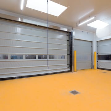 Porte souple automatique à empilage rapide